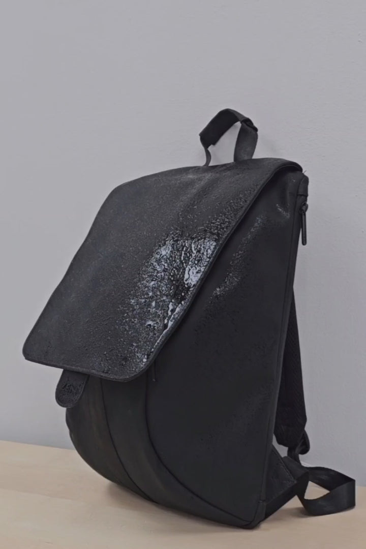 תיק גב למחשב נייד עמיד למים, כולל הרוכסן